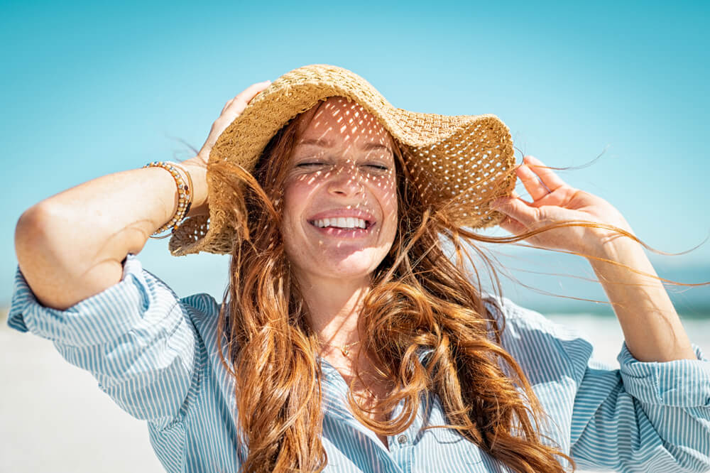 woman smiling sun