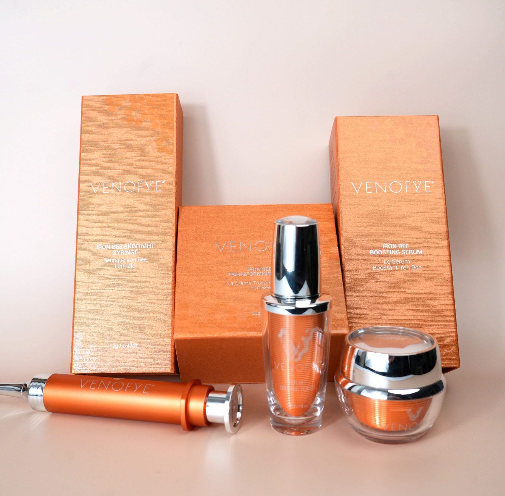 Venofye Iron Bee products with packaging behind them